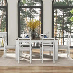 Ensemble table de salle à manger extensible en bois naturel, lavé et marron/blanc, avec 6 chaises, pouvant accueillir jusqu'à 8 personnes.
